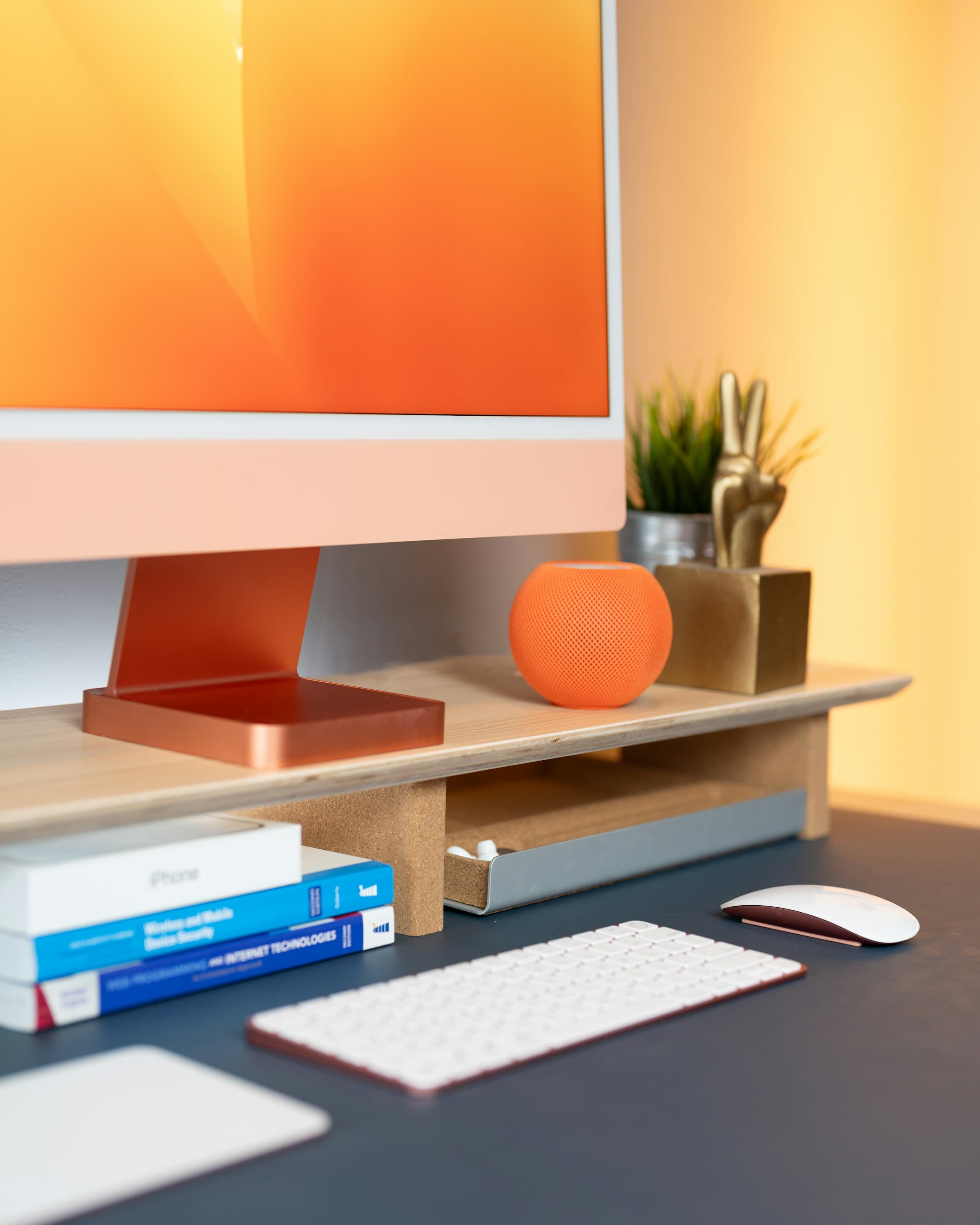 A colourful iMac on a desk, ready for its next owner